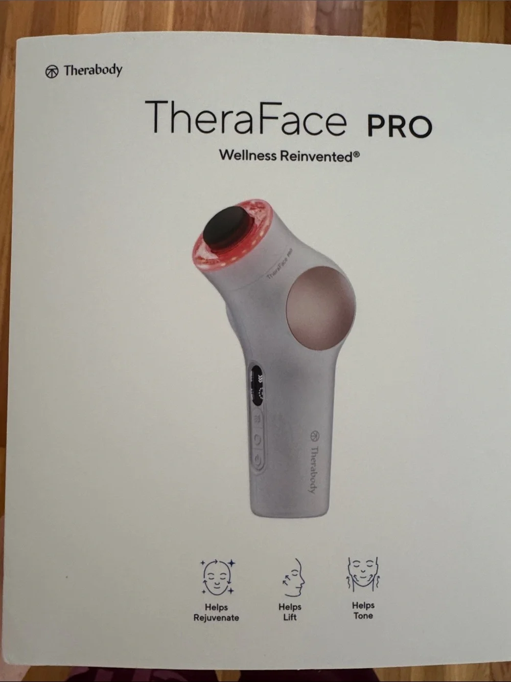 Therabody TheraFace PRO in White with Gold Accents